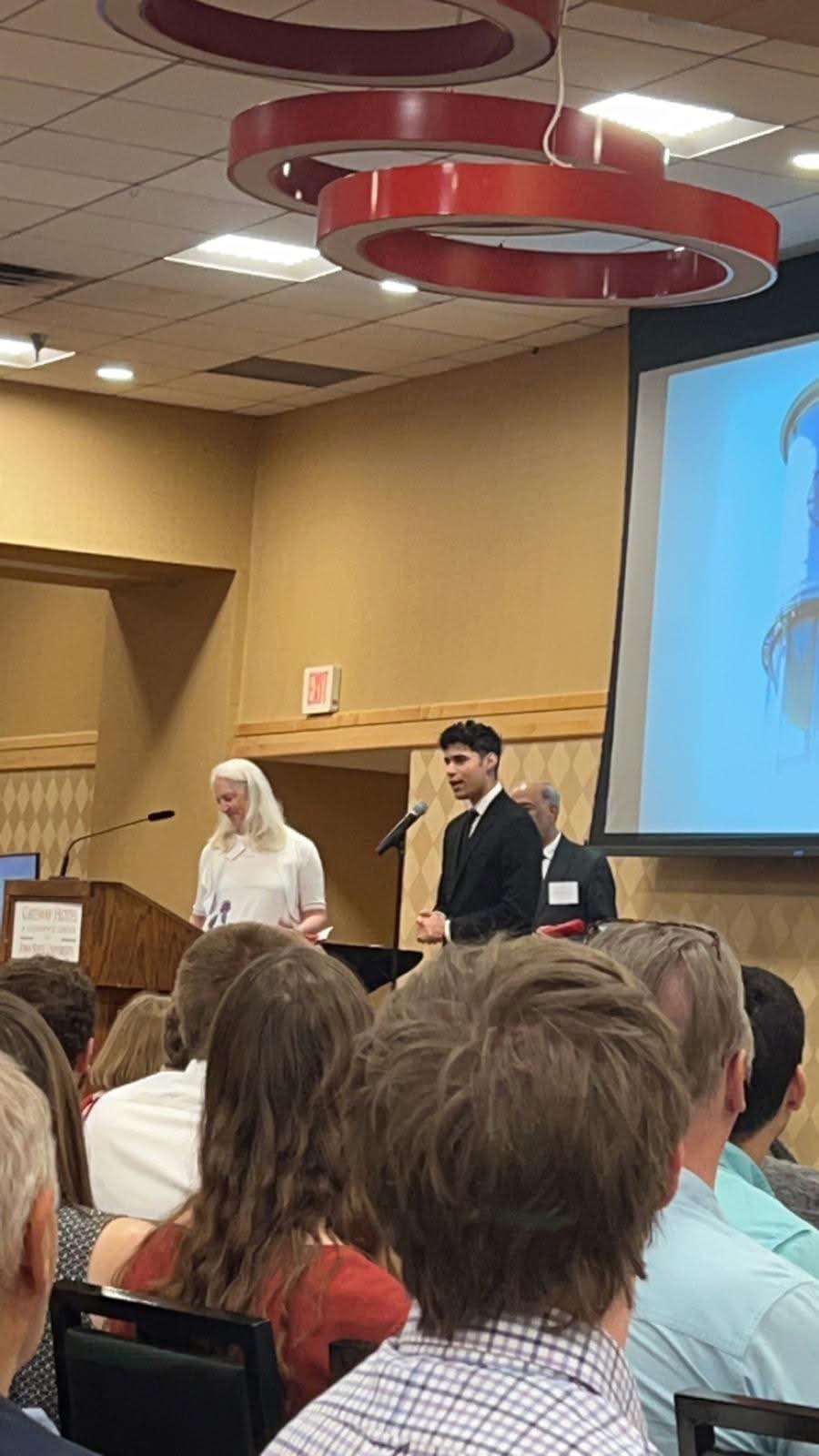 Sami Bensellam speaking at the Senior Design award ceremony